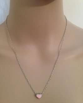 Delicate silver tone 16" link chain holds a tiny pale pink or pale blue enamel heart.