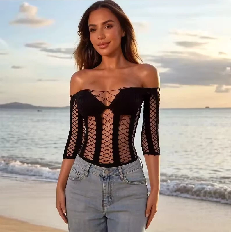 Criss Cross Pattern Swimsuit Cover New sheer top with crisscross strapping between solid panels. Very stretchy to fit many body styles.